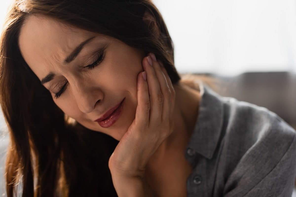 Featured image for “Is Ear Pain Normal After Tooth Extraction? A Dentist Explains”